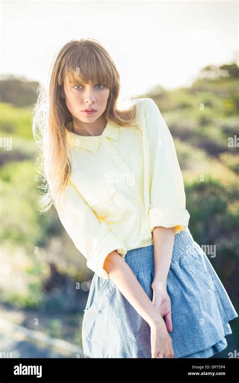 Timid Gorgeous Blonde On The Roadside Posing Stock Photo Alamy