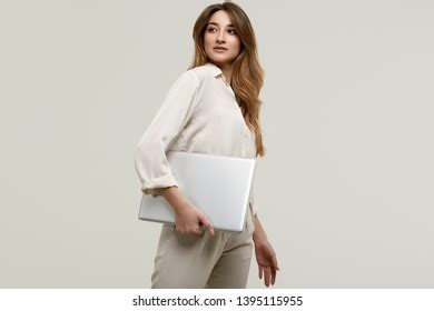130 Gorgeous Brunette Model Posing In White Clothes With Laptop Images Stock Photos 3D Objects
