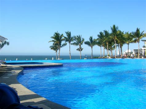 relaxing poolside  stock photo freeimages