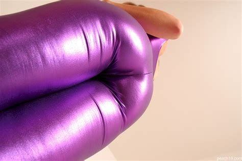 Amazing Chick Cate Harrington Showing Her Ass In Shiny Purple Pants Photos