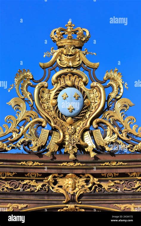 The Coat Of Arms Of French King Louis Xv On The Wrought Iron Gate Of