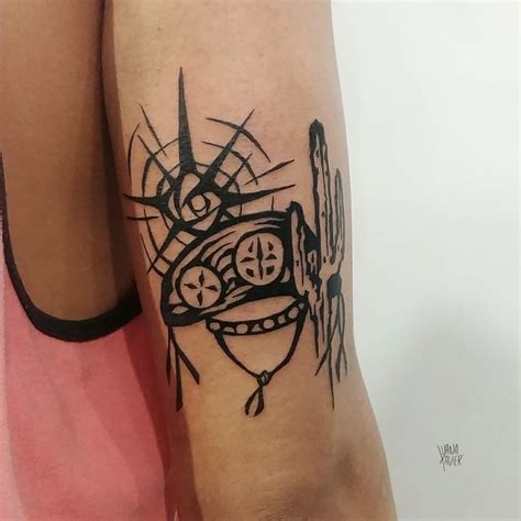 Luana Xavier Tattoo Nordeste Cangaço Tatuagem masculina braço