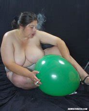 Pretty Bbw Chick Naked And Smoking While Sitting On Balloons Photos