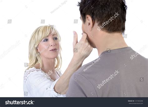 Mature Woman Caressing Her Husband Studio Stock Photo 141903298 Shutterstock