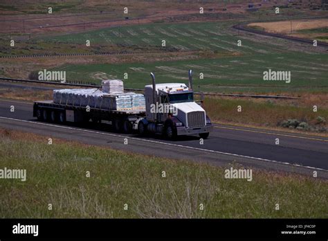 White Semi Truck Loaded Flatbed Trailer Stock Photo Alamy