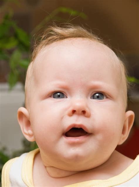 Baby smiles with two teeth stock image. Image of months - 17777707