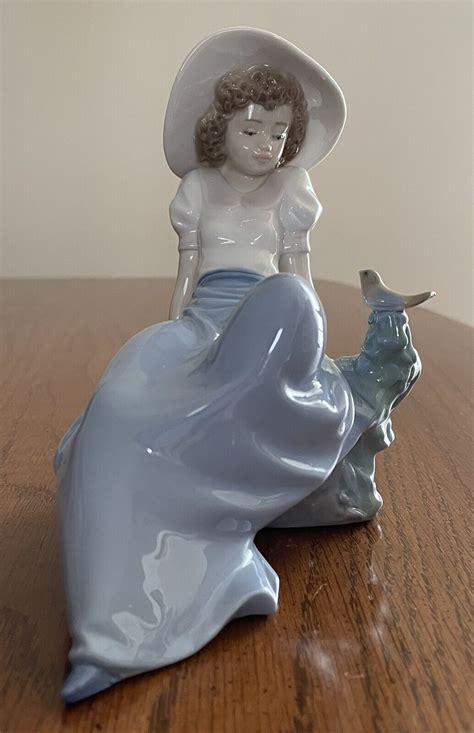 Nao Lladro Girl Sitting On Rock With Bird Porcelain Figurine Mint Ebay