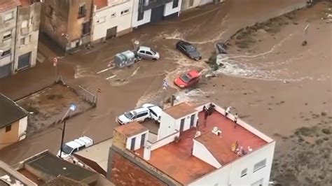 spain floods cars washed   torrential rain  aerial footage