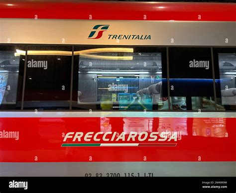 A Frecciarossa Train Car Sits In Milano Centrale Railway Station In