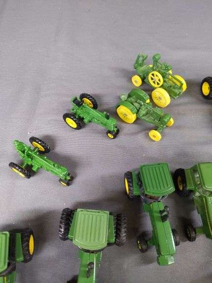 Lot Of Misc John Deere Miniature Tractors And Attachments Ek