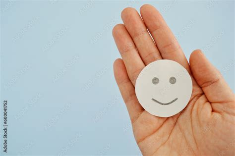 Smiley From White Paper On Blue Background World Day Of Peace Day