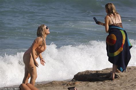 Emily Atack Shows Off Her Eye Popping Curves In A Plunging Gingham Bikini In Spain Daily Mail