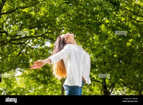 Beautiful Brunette In The Park Stock Photo Alamy