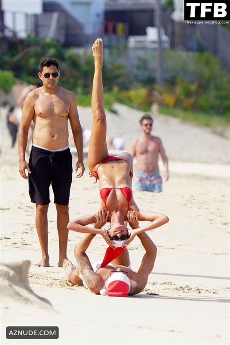 Izabel Goulart Sexy Gets Into The Christmas Spirit Wearing A Tiny Red Bikini At The Beach In St