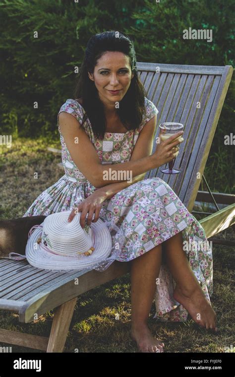 Woman Gardening Mature Girl Gardening In Her Backyard Spring Season Rural Scene Stock Photo