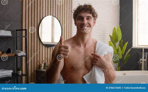 Naked Shirtless Fit Caucasian Happy Man In Bathroom Morning Hygiene Procedure Bath With Towel On