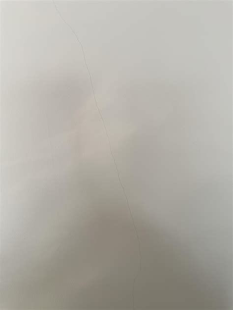 Hairline cracks appearing quite literally before my eyes. Living room