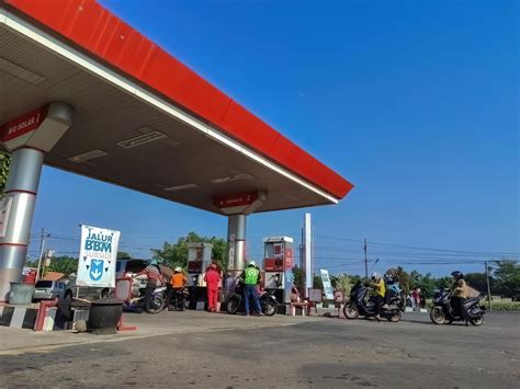 fuel queue at a Pertamina gas station. suitable for news on fuel