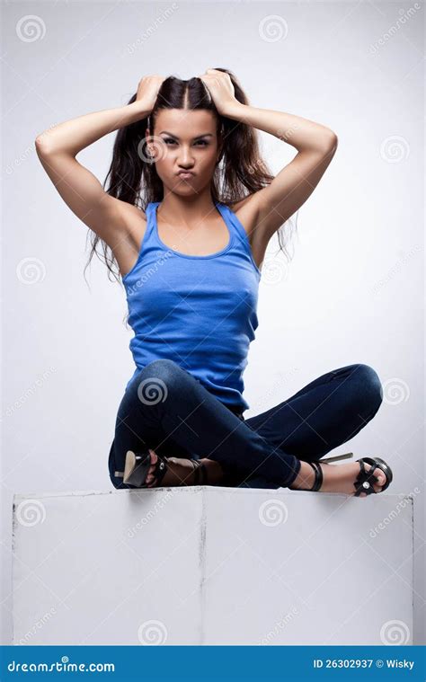 Brunette Sit In Jeans And Blue Tank Top Stock Image Image Of Fashion Dark 26302937