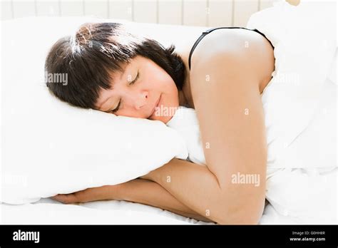 Pretty Brunette Woman In Bed Hi Res Stock Photography And Images Alamy