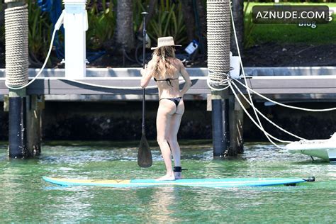 Gisele Bundchen Paddles Into Miami In A Sexy Black Bikini AZNude