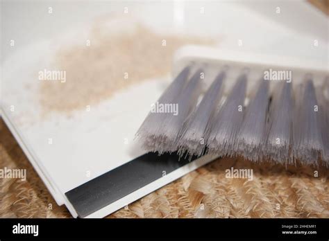 Floor Dust With Dust Pan Close Up Stock Photo Alamy