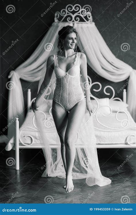 Beautiful Bride In White Lingerie Lying On The Bed In Her Bedroom Stock Image Image Of