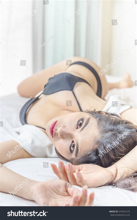 Sexy Asian Woman Black Bikini Lying Stock Photo 316541273 Shutterstock