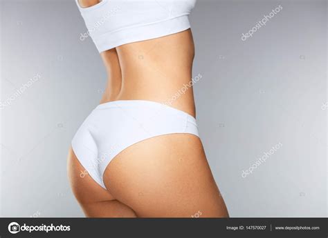 Closeup Of Beautiful Slim Woman Body With Sexy Buttocks Big Ass Stock Photo By Puhhha