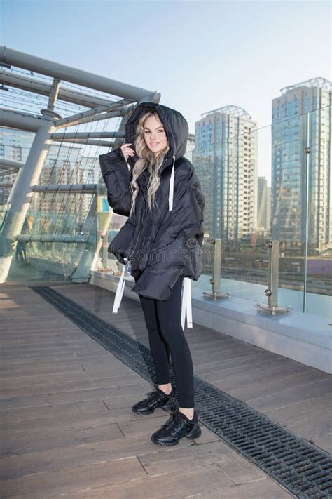 Lovely Blonde Dressed In A Warm Jacket And Pants Stock Photo Image Of Clothing Lady 252466406