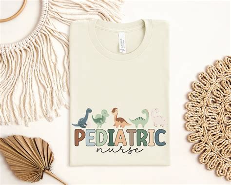 Cute Pediatric Nurse Shirt With Dinosaurs PEDS Nurse Shirt Pediatric