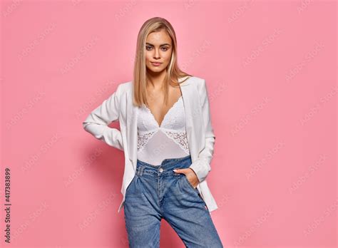 Fashion Photo Of Beautiful Blonde Female Model Isolated On Pink Background Stock Photo Adobe Stock