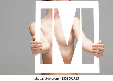 Nude Female Body Behind Stencil Letter Stock Photo 1339591925 Shutterstock