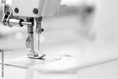 Banner industry tailor sewing machine on table workshop of white ...