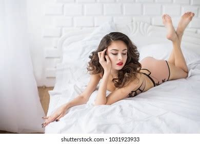 Beautiful Woman Lingerie Lies On Bed Stock Photo 1031923933 Shutterstock