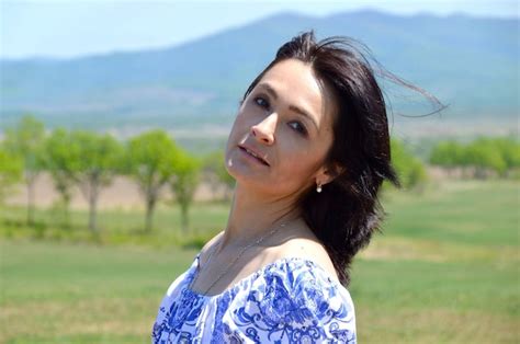 Premium Photo Portrait Of Russian Brunette Woman Looking At The Camera