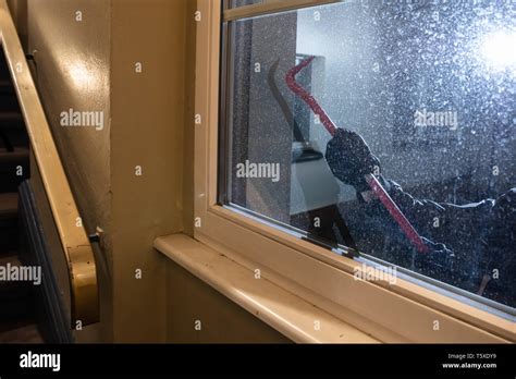 Burglar Window Climbing Hi Res Stock Photography And Images Alamy