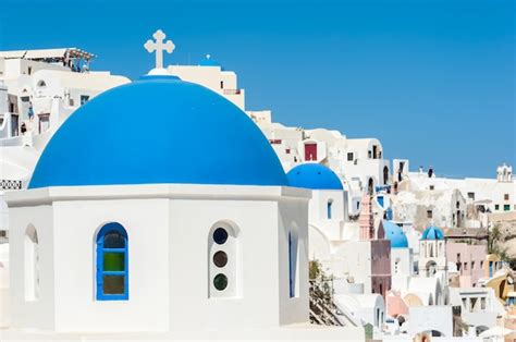 Premium Photo Blue Domes In Oia Santorini