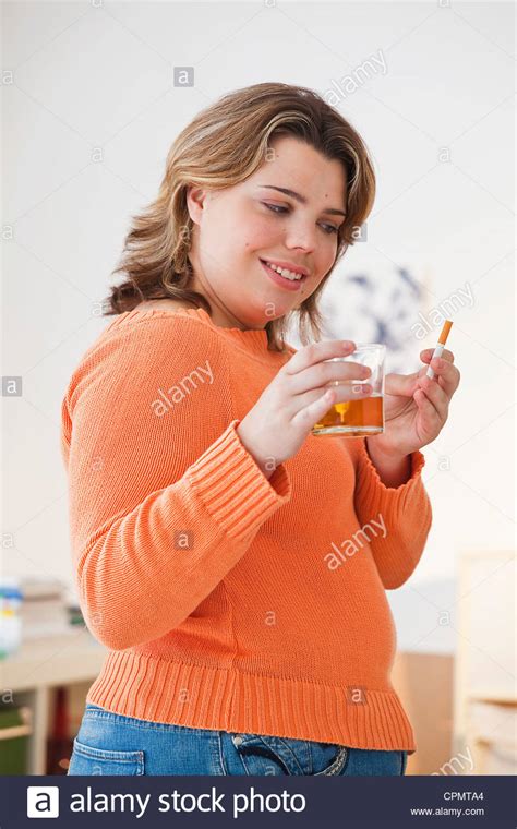 Overweight Woman Smoking Hi Res Stock Photography And Images Alamy