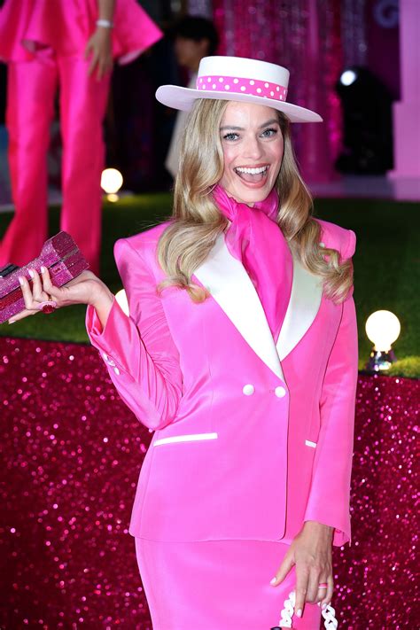 Margot Robbie Trades in a Pink Suit for a Ballerina Dress to Channel