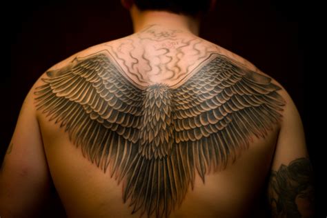 Wings Tattoo Meaning and Symbolism: Fully Explained - TattooClue.com