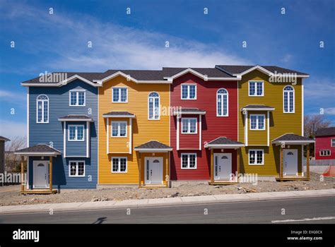 Four Brand New Colourful Row Houses On A Sunny Day In St Johns