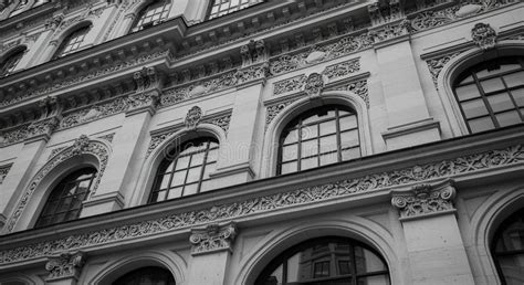 An Ornate Building Facade With Intricate Details And Classical