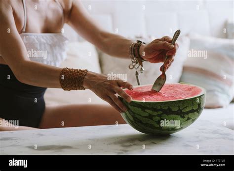 Woman In Bikini Eating Watermelon Hi Res Stock Photography And Images Alamy