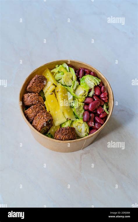 Healthy Food Bowl With Falafel Pineapple Mexican Red Kidney Beans And