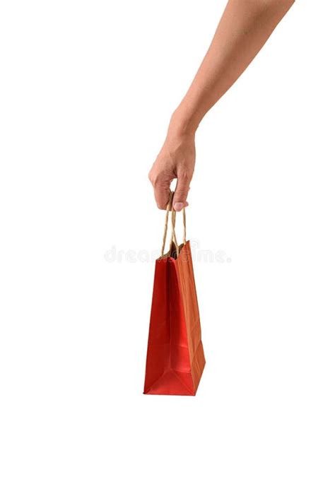 Mano Femenina Sosteniendo Bolsas De Compras De Papel Rojo Imagen De