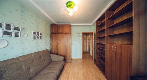 Modern Interior Of Living Room In Apartment Empty Wooden Shelves And