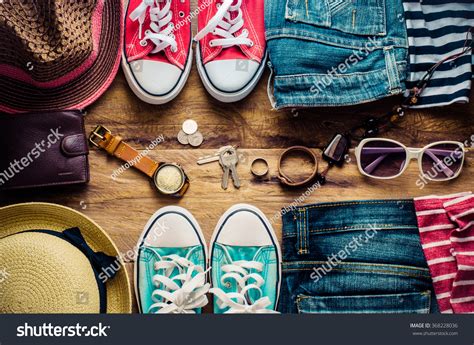 Clothing And Accessories For Men And Women Ready For Travel. Stock ... 