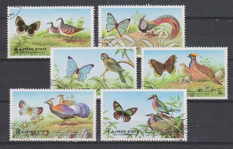 Ajman Oiseaux et papillons Série oblitérée MONDE Timbres