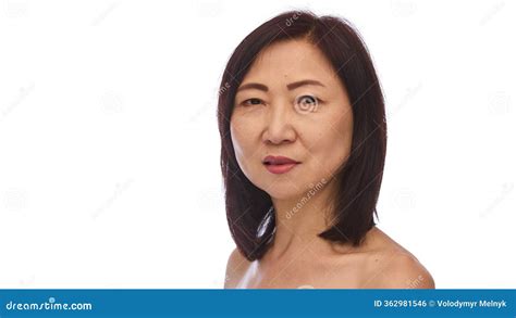 Portrait Of Attractive Korean Mature Woman In Her S With Dark Hair And Well Kept Healthy